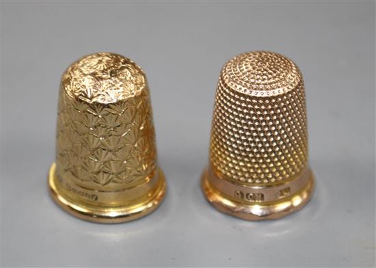 An early 20th century 15ct gold thimble, 5.3 grams and a 9ct gold thimble, by Charles Horner, 6 grams